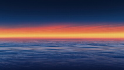 Obraz premium A beautiful sunset over the ocean with a few clouds in the sky