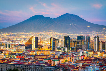Naples, Italy with the financial district skyline under Mt. Vesuvius