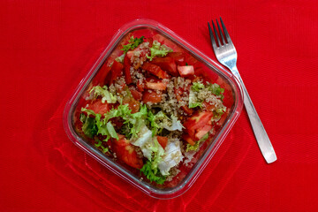 Healthy quinoa salad with tomato and lettuce