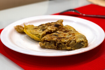 traditional Spanish potato omelette, juicy with onions