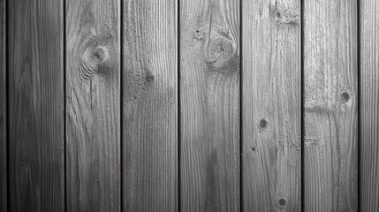 Obraz premium A black and white photo of a wooden wall