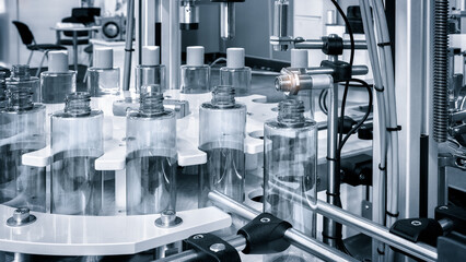pharmaceutical industry, medicine pills are filling in the  bottle on production line machine...