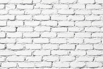 Obraz premium White brick wall showing textured surface details, minimalist style, isolated background. Concept of construction, architecture, simplicity. Ai generative