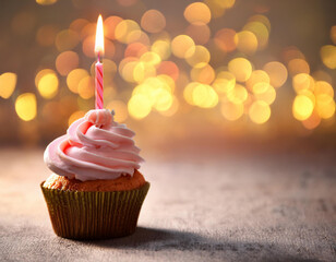 Delicious birthday cupcake with burning candle 