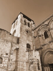 Fototapeta premium Historic Stone Architecture Tower Upward View Sepia Detailed Structure Sky