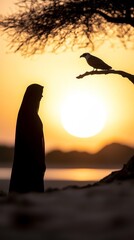 A woman standing in front of a sunset with a bird perched on a branch
