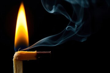A matchstick with a flame coming out of it