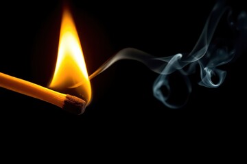 A lit matchstick with smoke coming out of it
