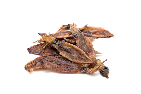 Pile of dried Beka Squid from the seafood souvenir market in Thailand isolated on white background.