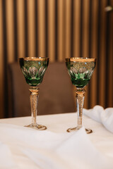 Decorating a hall for an expensive luxury wedding in a restaurant with lights, flowers, and seating details for guests