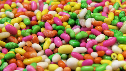 Sweet colorful candies displayed in a snack shop