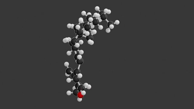 Molecule of cholecalciferol (vitamin D3) with the molecular formula C27H44O, represented by a ball-and-stick chemical model. Isolated. Gray background. Alpha channel. 3D rendering. Seamless loop