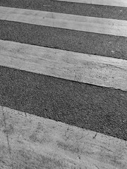 Fototapeta premium Detail of a road with asphalt and pedestrian crossing