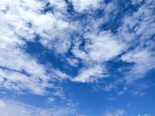 Vibrant Blue Sky with Gentle Clouds