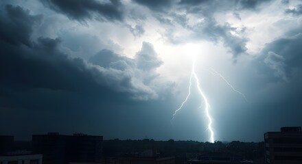 A powerful lightning bolt flashes in the sky, casting light over an urban landscape.