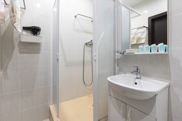 modern bathroom room with toilet and washing machine