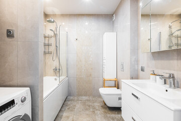 modern bathroom room with toilet and washing machine