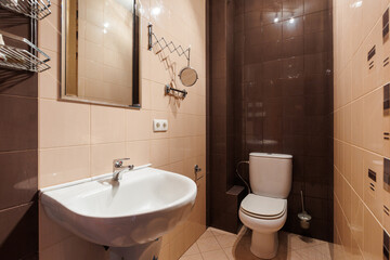modern bathroom room with toilet and washing machine