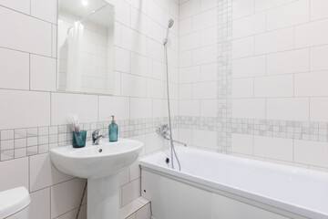 modern bathroom room with toilet and washing machine