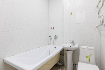 modern bathroom room with toilet and washing machine