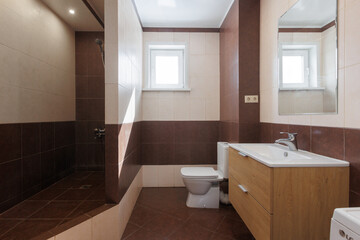 modern bathroom room with toilet and washing machine
