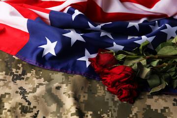 Veterans day. American flag, roses and military uniform, top view