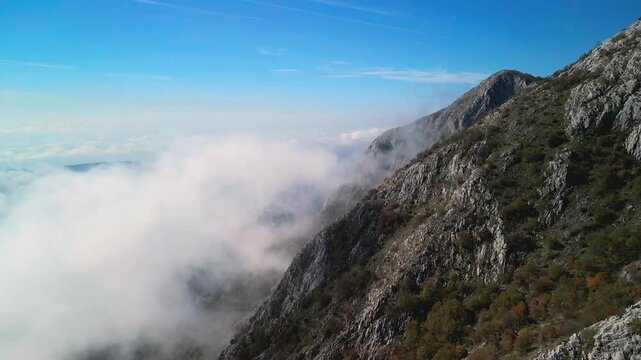 Orjen mountain massif above Herceg Novi, clouds near Mount Radostak and Vranjaj.