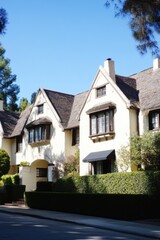 Charming vintage residence with steep roofs and intricate architectural details in a serene neighborhood during bright daylight