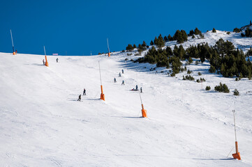 Skiers on the ski slopes in Andorra at Grandvalira in January 2025.