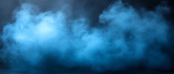 Fototapeta premium Blue smoke texture on dark background.