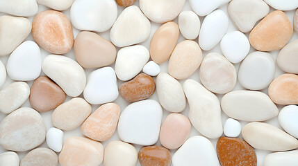 Obraz premium Smooth pastel pebbles texture background, spa, wellness, website design.