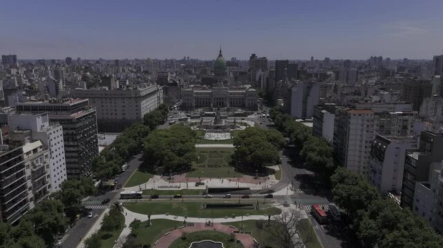 Drone flies over Plaza Mariano Moreno and the National Congress at midday in Buenos Aires, Argentina