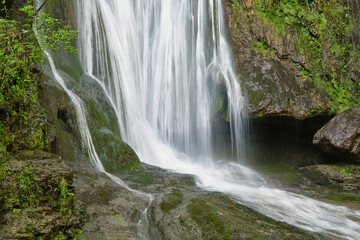 The Cascade d'Autoire waterfall in summer. A 30 meter high waterfall near Autoire in Lot Occitanie Southern France	