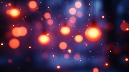 Obraz premium Glowing orange and blue bokeh lights.