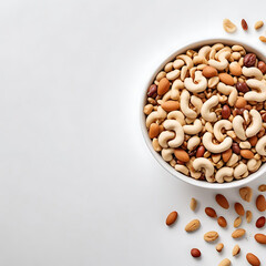 A bowl of mixed nuts and seeds, representing healthy snacks, on a clean white background.