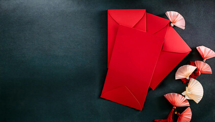 Chinese New Year red envelopes, empty space for text black background