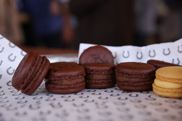 Dark Chocolate Brown Macarons Ready to Serve on decorative tray