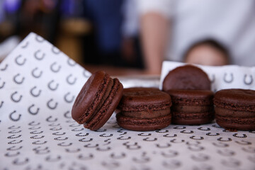 Dark Chocolate Brown Macarons Ready to Serve on decorative tray