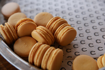Lemon Yellow Macarons Ready to Serve on decorative tray