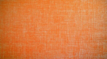 Fototapeta premium Orange textured background. Close-up view of a woven fabric with subtle light and dark variations creating a textured effect. Ideal for design projects.