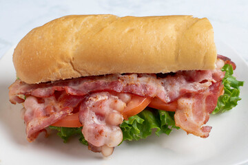 blt sub  sandwich with a pickle