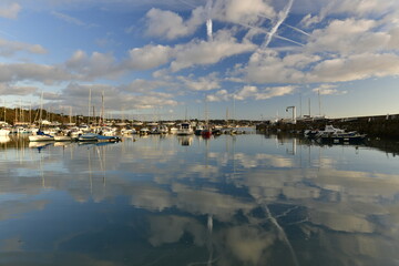 St.Aubin's Harbour, Jersey, U.K. Beautiful sunrise reflection of the small port in Winter.