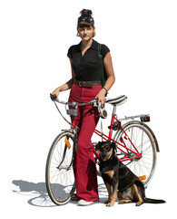 Young woman with a bike and a dog standing outside in the street and looking around isolated on...