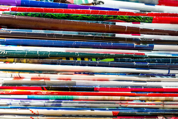 Many newspapers and colorful magazines spines