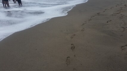 footprints on the beach