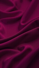 Obraz premium Deep purple silk fabric draped with elegant folds and a smooth texture, creating a luxurious and sophisticated background.