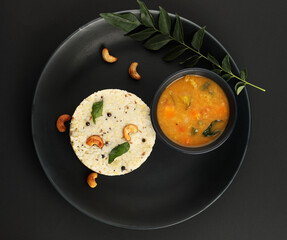 Ven Pongal with Sambar, coconut Chutney popular Indian breakfast food Tamil Nadu festival Pongal Sankranti Diwali spicy pongal
