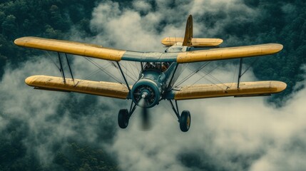 Vintage Biplane Flying Through Clouds Above Forest
