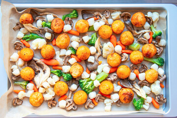 baked potatoes with mushrooms and scallops with vegetables