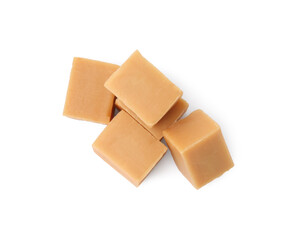 Tasty sweet caramel candies isolated on white, top view